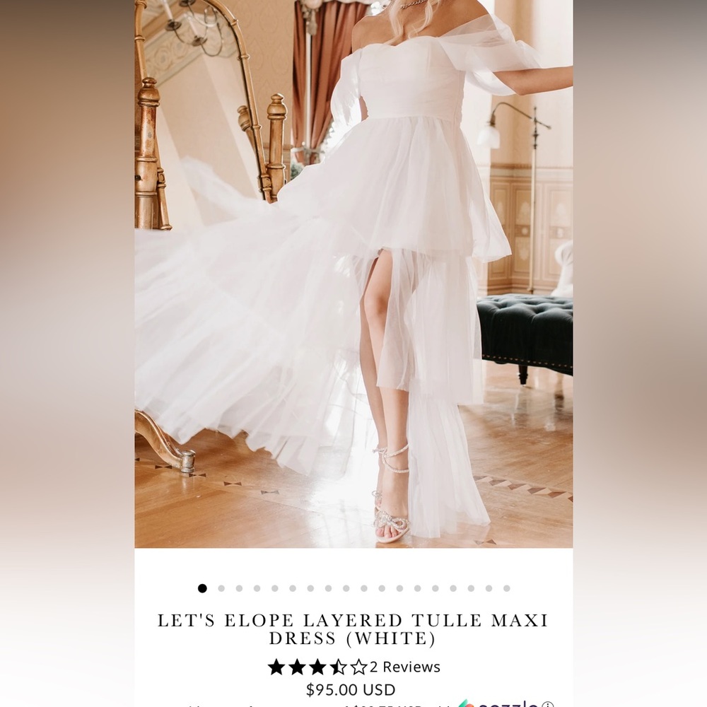 White wedding/formal dress. Never worn only tried on once and did not like it on